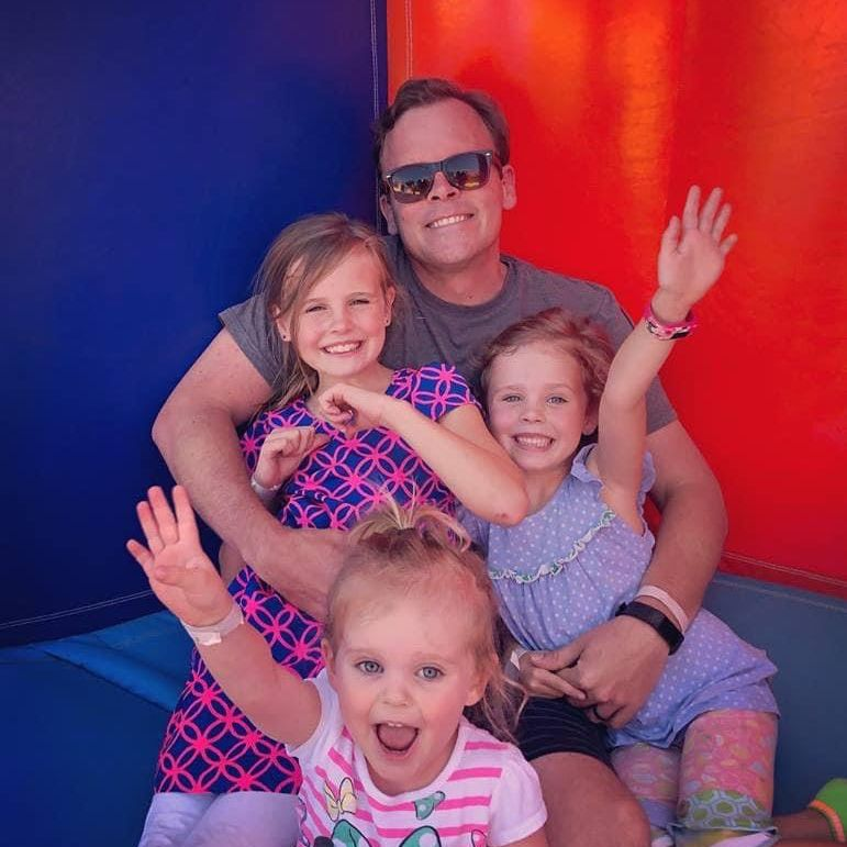 Joshua Dobson with his three daughters